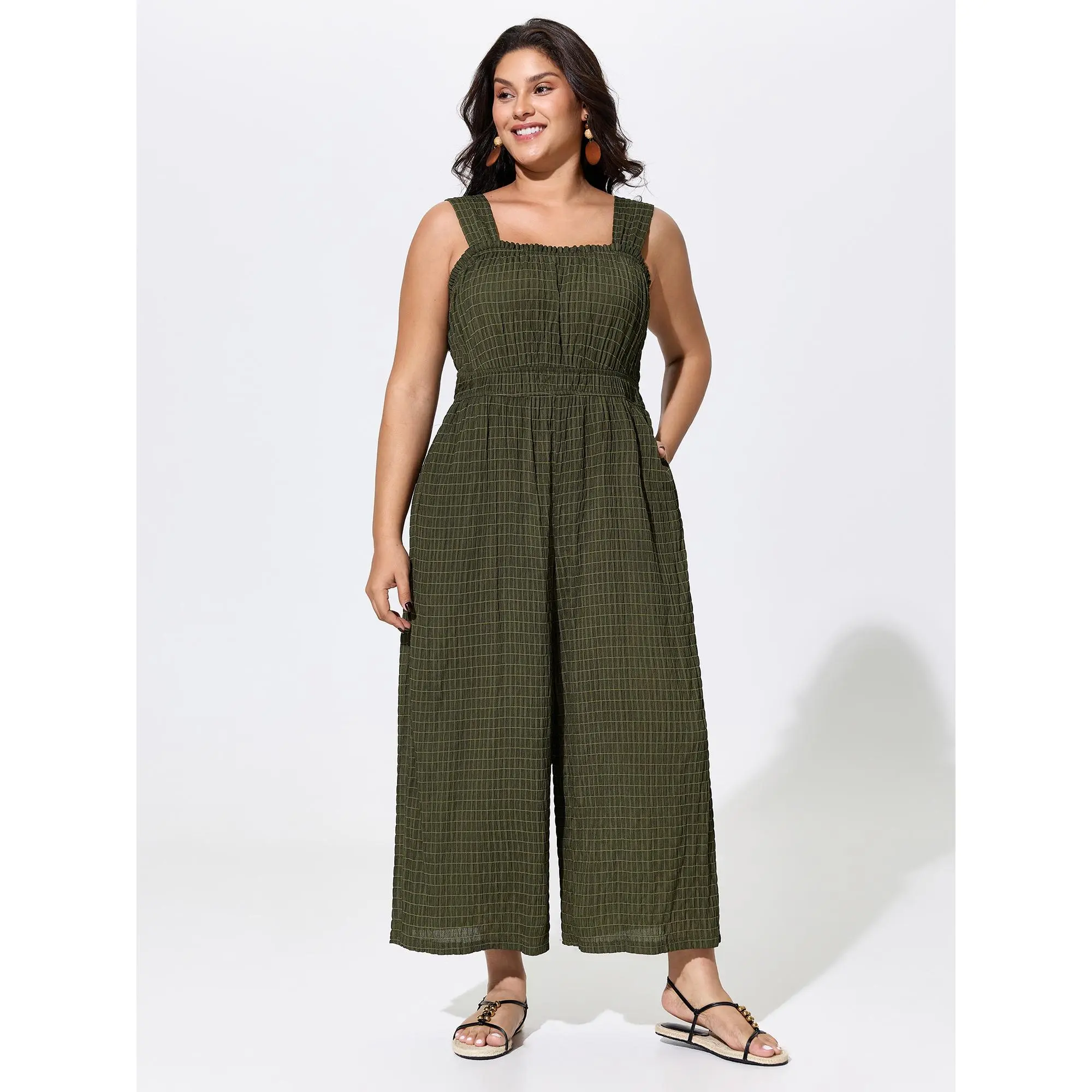 BloomChic Women's Plus Size Solid Boho Jumpsuit, a Casual Sleeveless Garment in Smooth Polyester Spandex with a Shirred Smocked Waist, Fabric, Fit, Pocket, Low Iron, Dress, Shirred Waist, Cold Wash, Basic, Hidden Pocket, Multi-Size, Daily