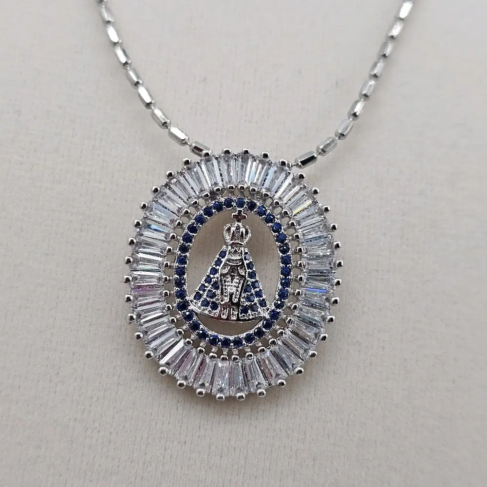(56l)  silver virgen  medall and chain 18 inches