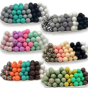 50PCS 15mm silicone bead set featuring a mix of printed and solid-color beads, perfect for DIY crafts like keychains, necklaces, bracelets, decorative pens, jewelry, and pendants.