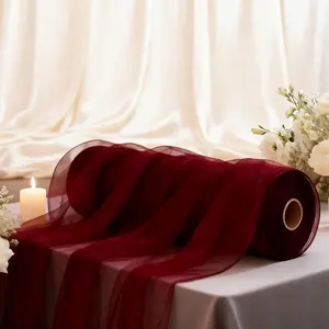 One roll of elegant burgundy tulle fabric in "lcb" drape, perfect for wedding arches, birthday parties, Christmas, Halloween, bridal showers, Valentine's Day, Easter, and Mother's Day.