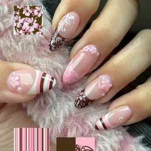24pcs medium length almond Y2K press on nails gentle nude pink and brown classic color blocking, pink brown white stripes, cute French manicure, 3D pink flowers, stars, pearls, suitable for spring outings and shopping fake nails Nail Art Design