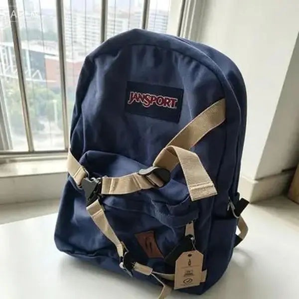JanSport Fashion Distressed Blue Canvas Backpack Retro American Campus Style Anti-slip Chest Strap Spacious Laptop Storage Backpack For Teens