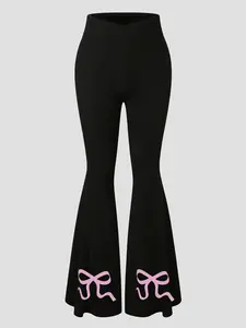 Women's fitted leggings with a bowknot graphic pattern print, criss-cross waistband, and flared leg design.  Comfortable to wear, suitable for all seasons, and a fashionable, versatile and casual everyday pant for women.