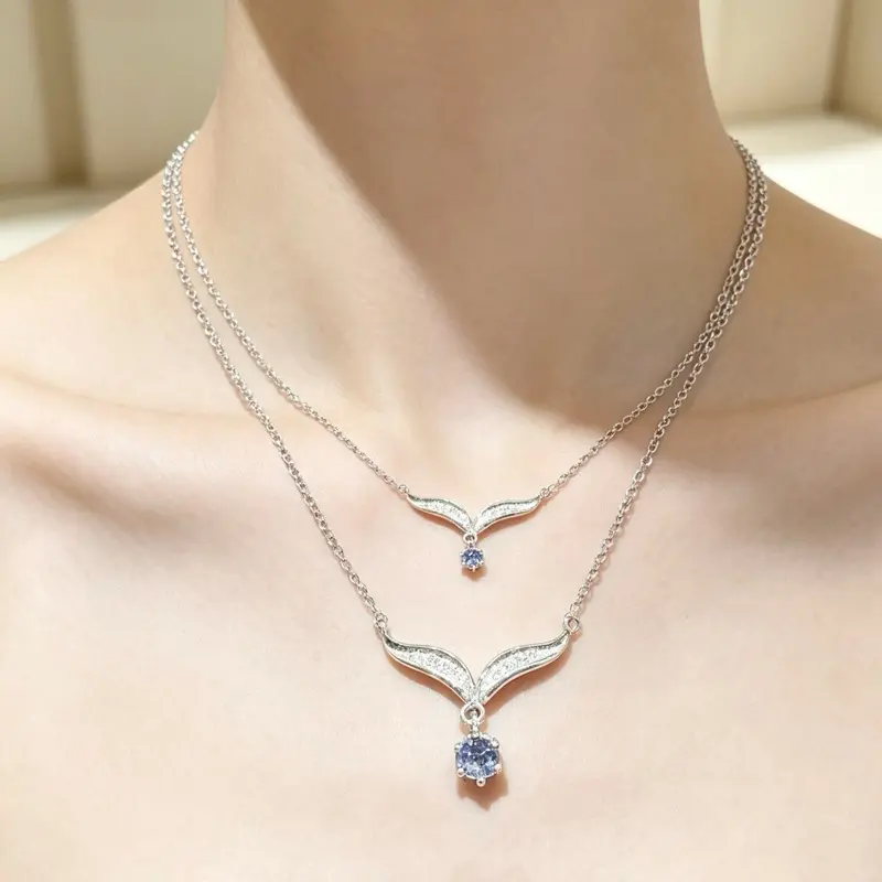 <PingEast jewelry > 925 Sterling Silver Inlaid with 4mm Natural Tanzanite Wing Pendant Necklace