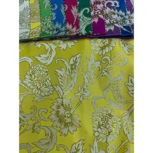 Brocade gold lurex, floral fabric 45” wide. Sold by the yard.