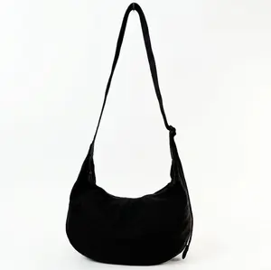BAGGU Medium Nylon Crescent Bag - Casual & Spacious with Zippered Pockets & Adjustable Strap - 100% Recycled Nylon - Machine Washable - 13.75 x4"x8"