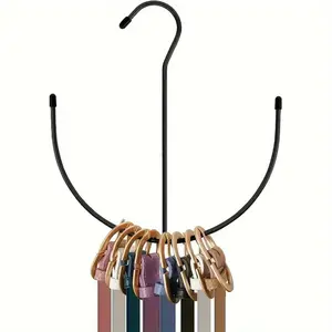 Say goodbye to cluttered closets. This hanging organizer, Holder, is a storage powerhouse holding 10+ ties, 5+ scarves, 10+ belts. The swivel forked design makes it easy to grab what you need. It's compact, space-saving—perfect for renters