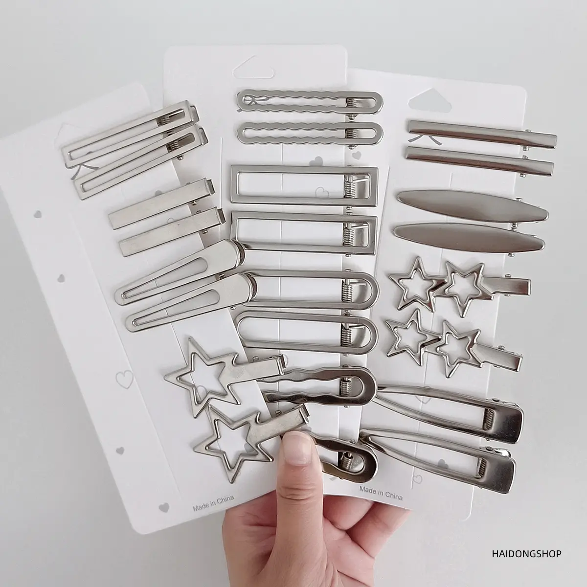 24-Pack trendy hollow star alligator hair clips inspired by celebrities, versatile casual metal snap barrettes that match any outfit, non-slip hair accessories with a secure strong grip for women and teen girls—perfect for everyday hairstyling, Y2K street