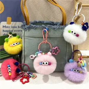 Internet celebrity cute cartoon keychain ugly cute creative small coal ball plush doll schoolbag pendant student doll gift