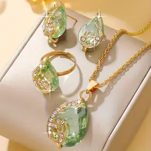 4-piece elegant and fashionable men's jewelry set, featuring a luxurious teardrop-shaped glass rhinestone pendant necklace and a matching earring and ring set, makes a charming gift.