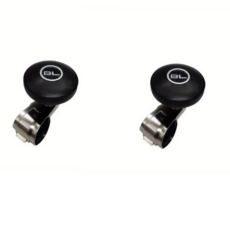 Two carbon fiber steering wheel knobs and a car steering assist