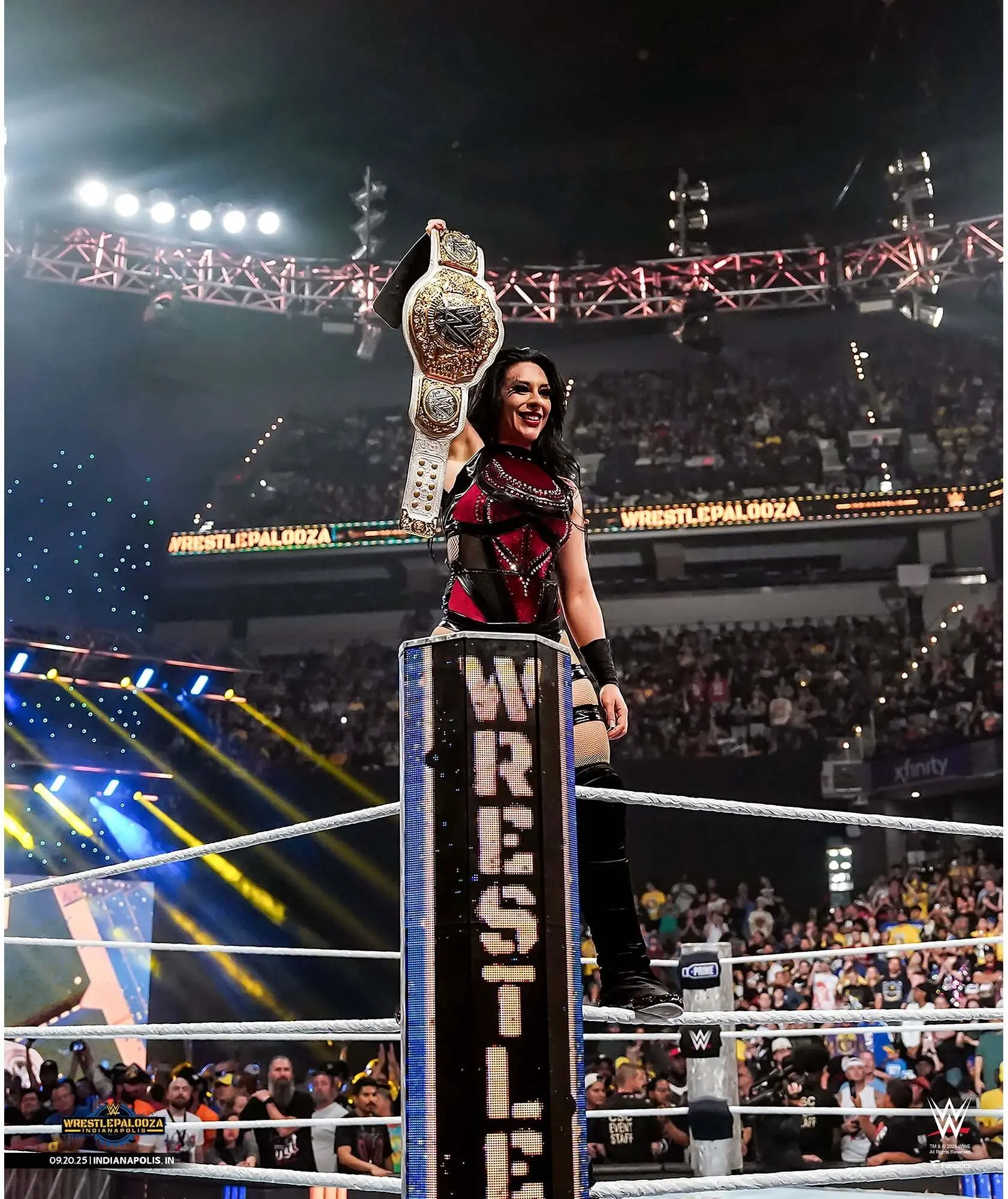 Stephanie Vaquer WWE Unsigned Raising Women's World Title Photograph - Wrestling Memorabilia