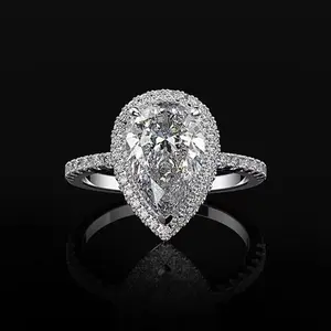 A delicate teardrop-shaped ring with miniature cubic zirconia stones, perfect for women - a romantic engagement piece, April's birthstone, suitable for everyday wear or as a gift for a special occasion. sterling silver zircon prong inlay gauge septum oval