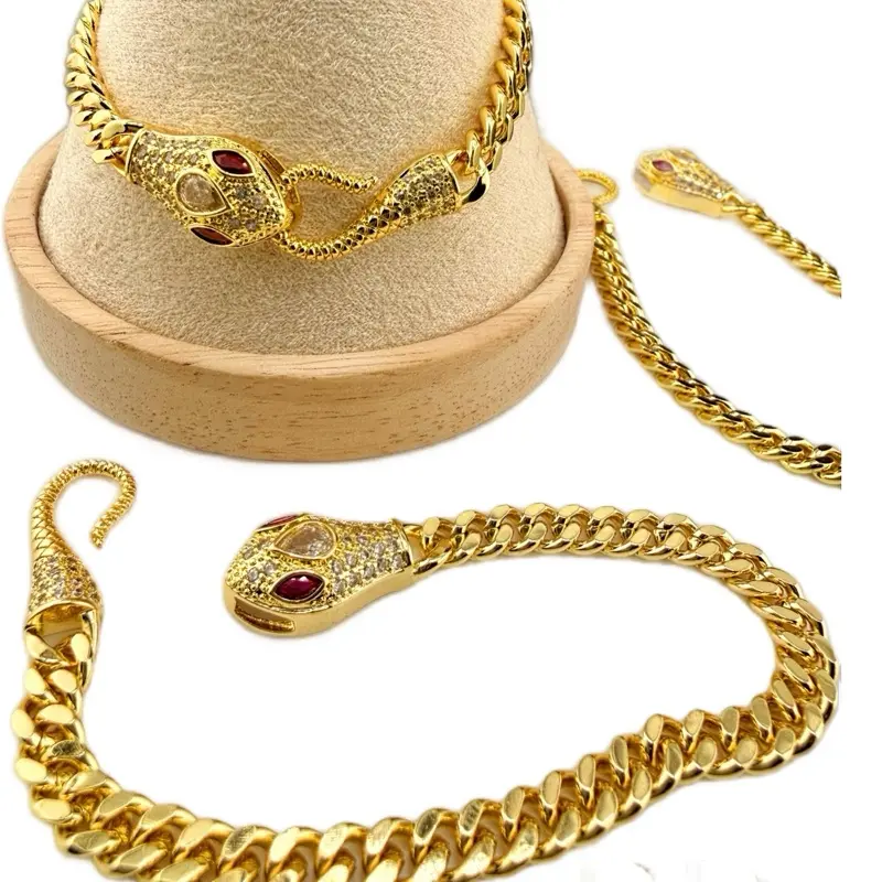 Serpentina Luxe 14K Gold Filled Serpentia Bracelet with Pavé Crystal Serpent Clasp Ruby Tone Eyes 7 Inch Hypoallergenic Tarnish Resistant Cuban Link Chain