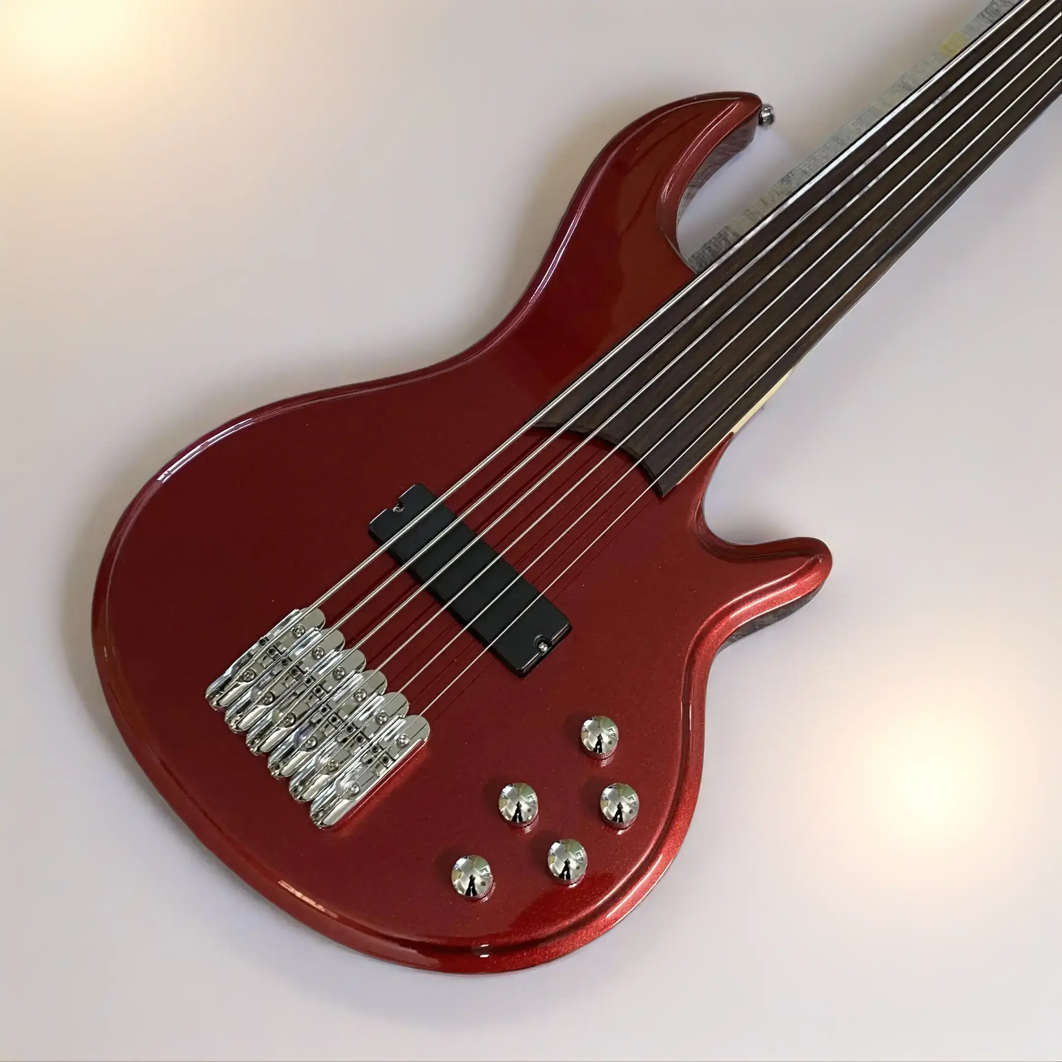 6-String Metallic Red Fretless Bass Guitar with Rosewood Fingerboard, Maple Neck - Versatile for Beginners, Experienced Players and Musicians