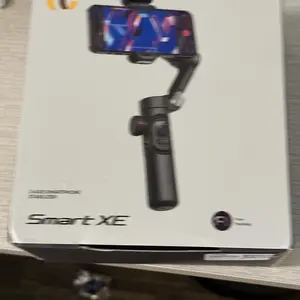 Product Review of Handheld 3 Axis Anti-shake Shooting Stand (1 Count), Rotating Automatic Face Tracking Tripod Stabilizer for Live Video, Phone Accessories, Content Creator Tools from W** M** P**r