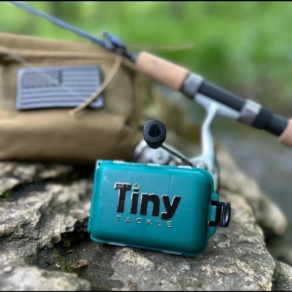 Tiny Tackle Ultralight Fishing Bundle- Includes 1 loaded Tiny tackle box, 1 pack of soft plastics, 12 jig heads, 1 rigging guide, and one fishing hook hat clip!