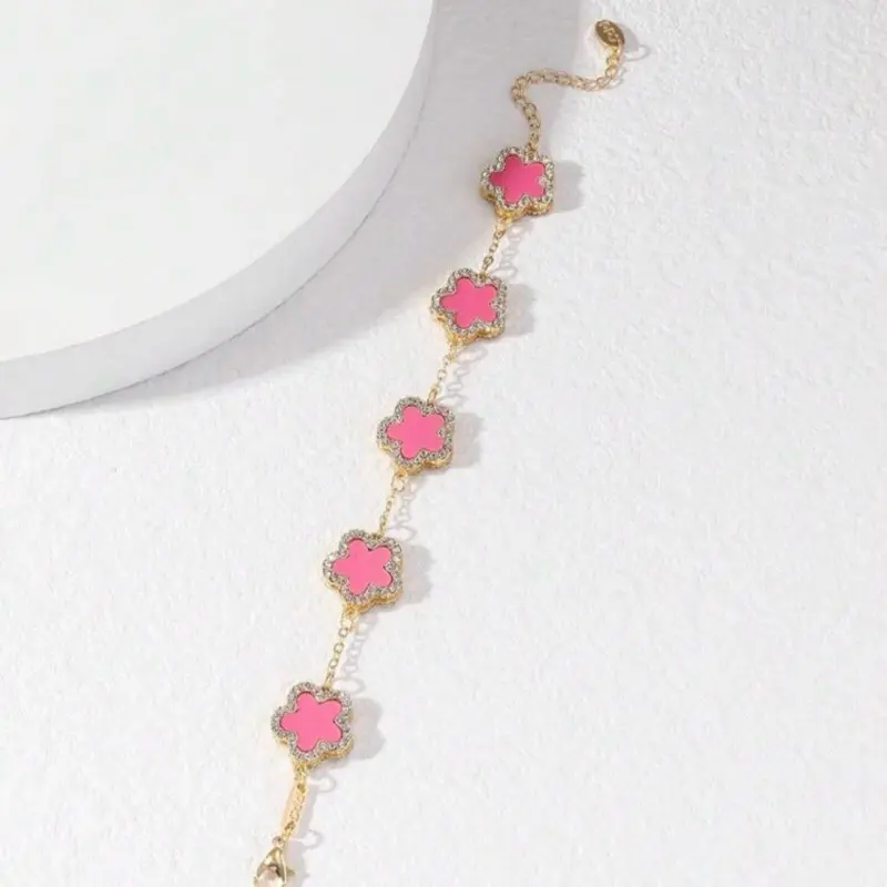 Pink clover gold studded bracelet