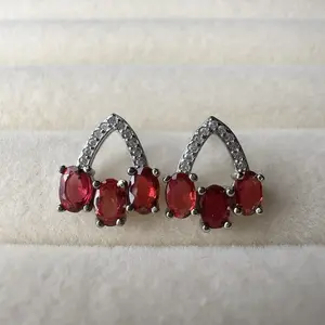 <PingEast jewelry > Classic sparkle — these 925 sterling silver stud earrings showcase three 3×5mm natural sapphires securely held in a delicate claw setting. Certified authenticity included