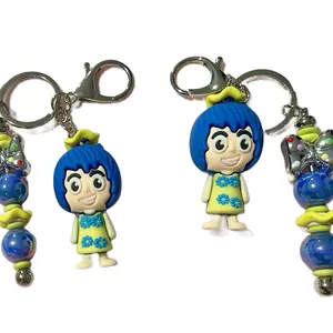Keychain - Featuring Character with Blue Hair and Yellow Dress Decorated with Beads