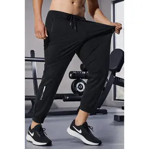 Men’s lightweight jogger sweatpants with zippered pockets, cuffed ankles, and a stretch fabric—athleisure pants for big guys, suitable for athletic workouts, running, and gym wear, fashionable for spring and summer
