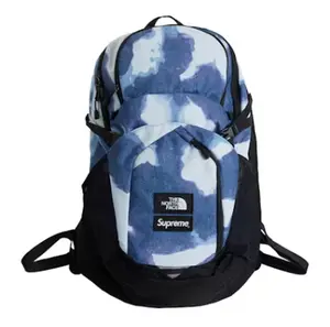 Supreme x TNF Bleached Denim Print Pocono Backpack Indigo