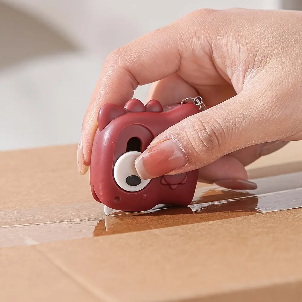 1 Pc Mini Dinosaur Box Cutter – Magnetic safety opener for packages and cartons, Office Cutting Supply, Home Office. Portable compact design for easy unboxing, safe and convenient everyday tool.