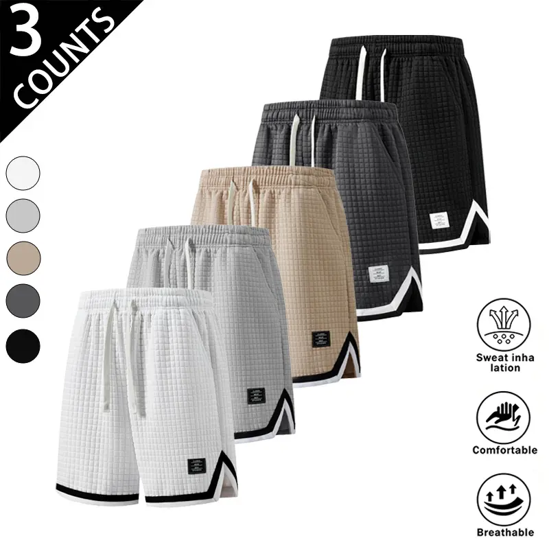 3-pack men’s casual shorts with a waffle texture and side contrast slit design. Drawstring elastic waistband fits various body types, honeycomb fabric is breathable and soft, loose fit—versatile and stylish for everyday wear, home, and outings.