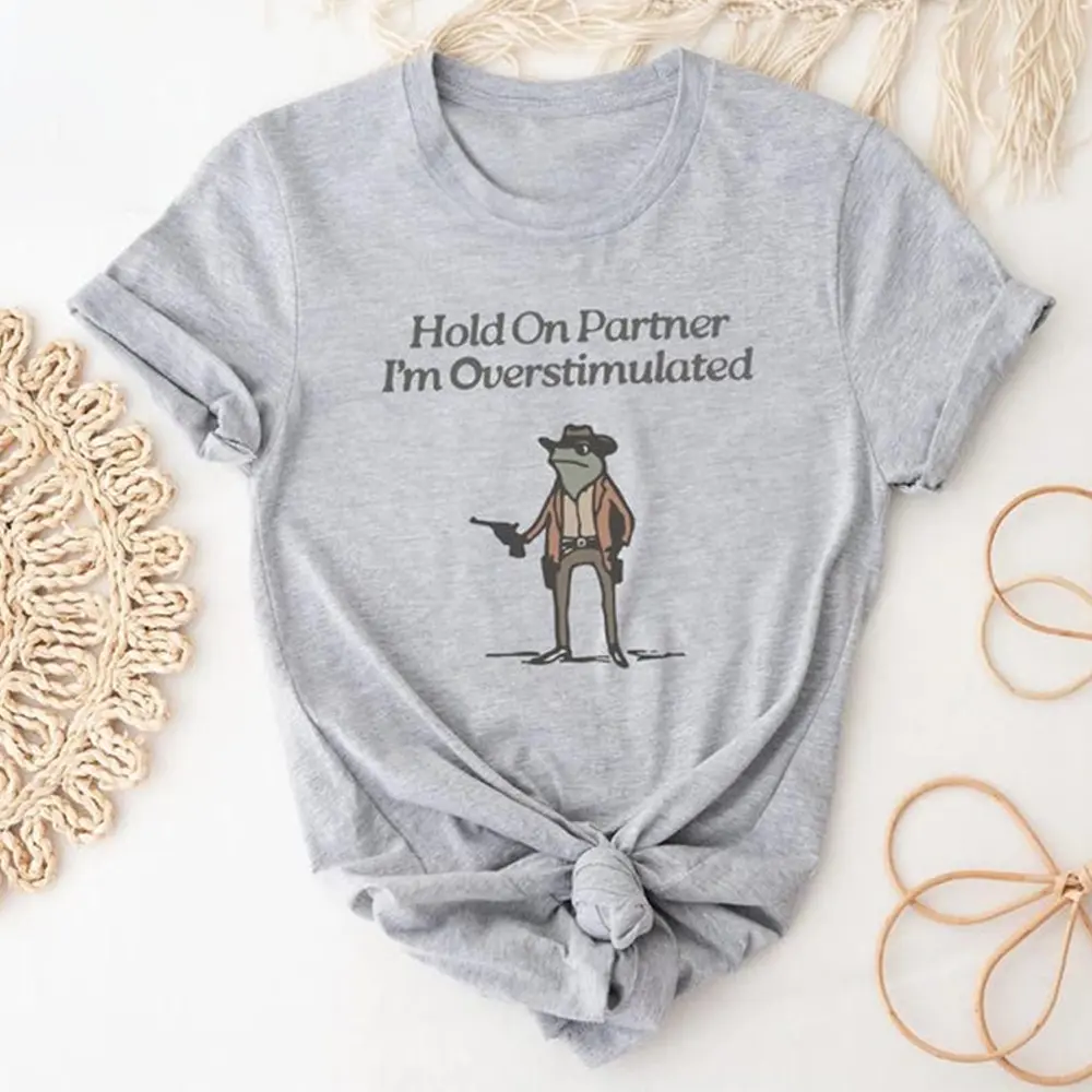 Hold On Partner I’m Overstimulated T-Shirt – Funny Cowboy Frog Meme Tee, Weirdcore Aesthetic Shirt, Gen Z Unhinged Graphic Tee