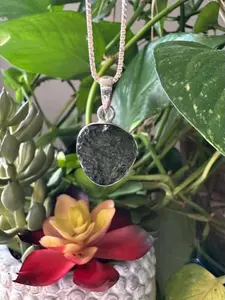 Authentic Moldavite Pendant with Necklace: A 2.9 grams genuine celestial gem, verified for authenticity. Embrace cosmic energies, deepen your spiritual connection, and leap to a transformation journey. Elevate your style and consciousness now.