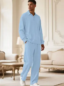 2-piece men's solid color textured long-sleeve Polo shirt and drawstring pants set, with a regular fit casual top and pocket pants featuring split cuffs. Ideal for men's daily outings and trips. Casual Lounge Set