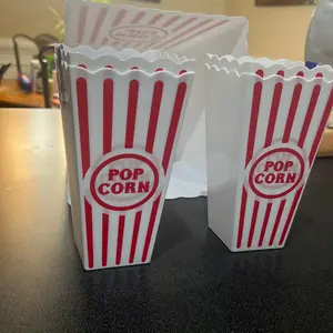 Five piece popcorn bin set. Four small plastic popcorn tubs and one large popcorn tub. Perfect for movie nights.