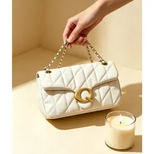Luxurious and fashionable rhythmic soft crossbody bag |   Iconic gold Q-lock details