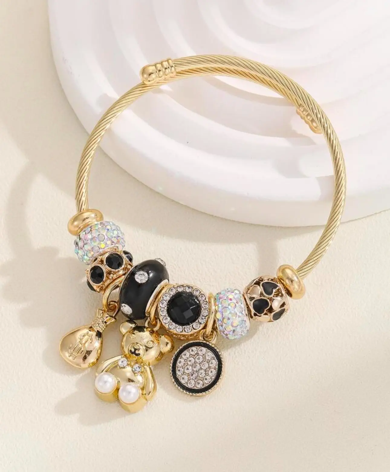 Brazalete elegante con diseño de oso de acero inoxidable, uso diario y duradero, material anticorrosivo.