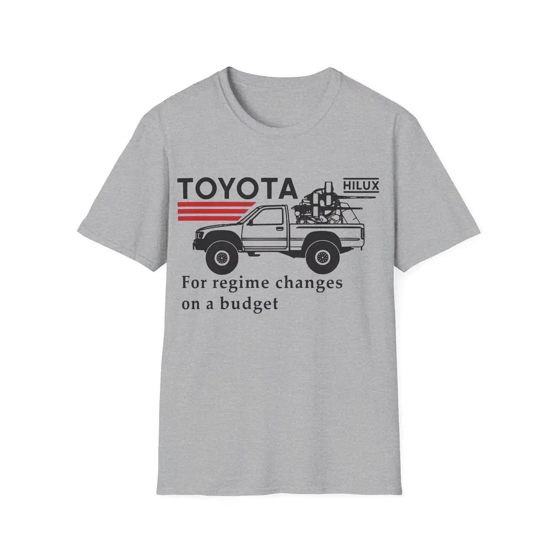 A T-shirt that says Toyota Hilux for regime changes on a budget" celebrates the legendary pickup truck that can withstand any conflict