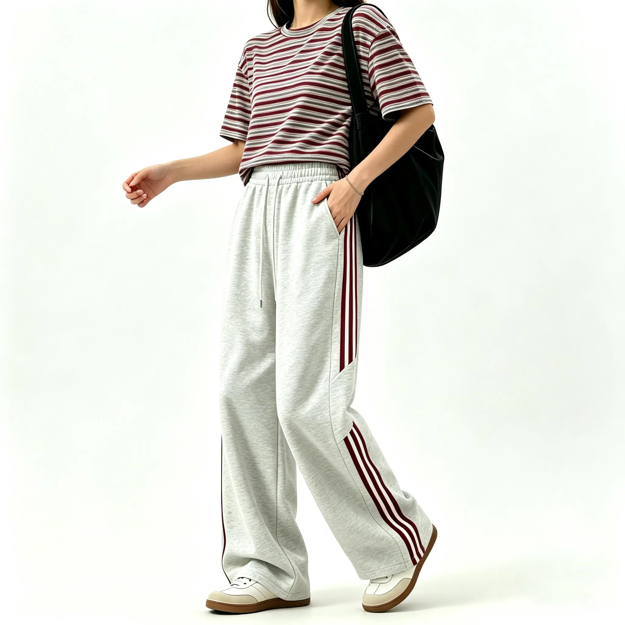 Women’s skin-friendly knit drawstring elastic waistband, side three white stripe panels, straight-leg long pants with a fluid drape; loose fit that flatters and slimming; casual, versatile for everyday wear in spring and autumn.