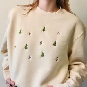 Winter Ski Hill Embroidered Crewneck Sweatshirt with Delicate Skier Details and Colorful Outfits Long Sleeve Cozy Design for Vintage-Inspired Winter Vibes for Christmas Gift