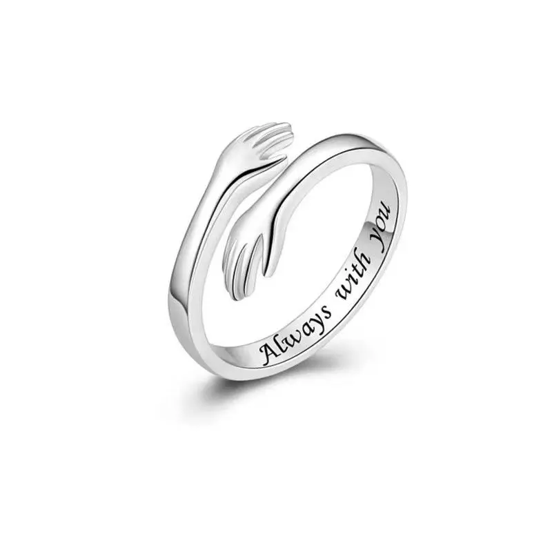 Lady's hands embrace the ring as a gift to her; a symbol of love and protection.