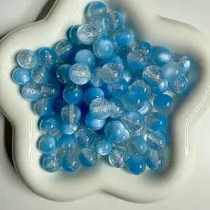 Acrylic 16mm beads with silver glitter for craft projects.