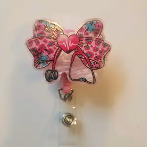pink medical or nurse bow badge reel