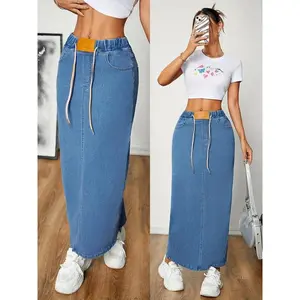 Women’s casual denim skirt with an elastic drawstring waist, rear slit, high-waisted long denim skirt, large pockets, a pull-out design, streetwear style, A-line cut, available in blue and black, suitable for autumn wear. GARMENTARY