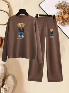 Women's Autumn/Winter Warm Sweater & Pants Set: Casual teddy bear doll decoration Print Bow Pattern, Oversized Crew Neck Top + High-Waisted Flare Pants, Dual Use for Home & Commute, Soft & Skin-Friendly