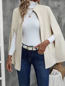 A ladies' peach-colored design trench coat Outerwear made of gabardine, providing warmth in autumn and winter, with a fashionable and elegant style, and suitable for various occasions.