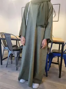 Elegant Long Sleeve Islamic Abaya Dress for Women, Loose Fit Arabic Round Neck, Dual Pockets, Split Cuffs, Perfect for Muslim Fashion, Abayas for Eid