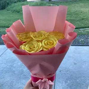Yellow Rose Bouquet with Pink Paper Wrapping and Pink Bow for Special Occasions