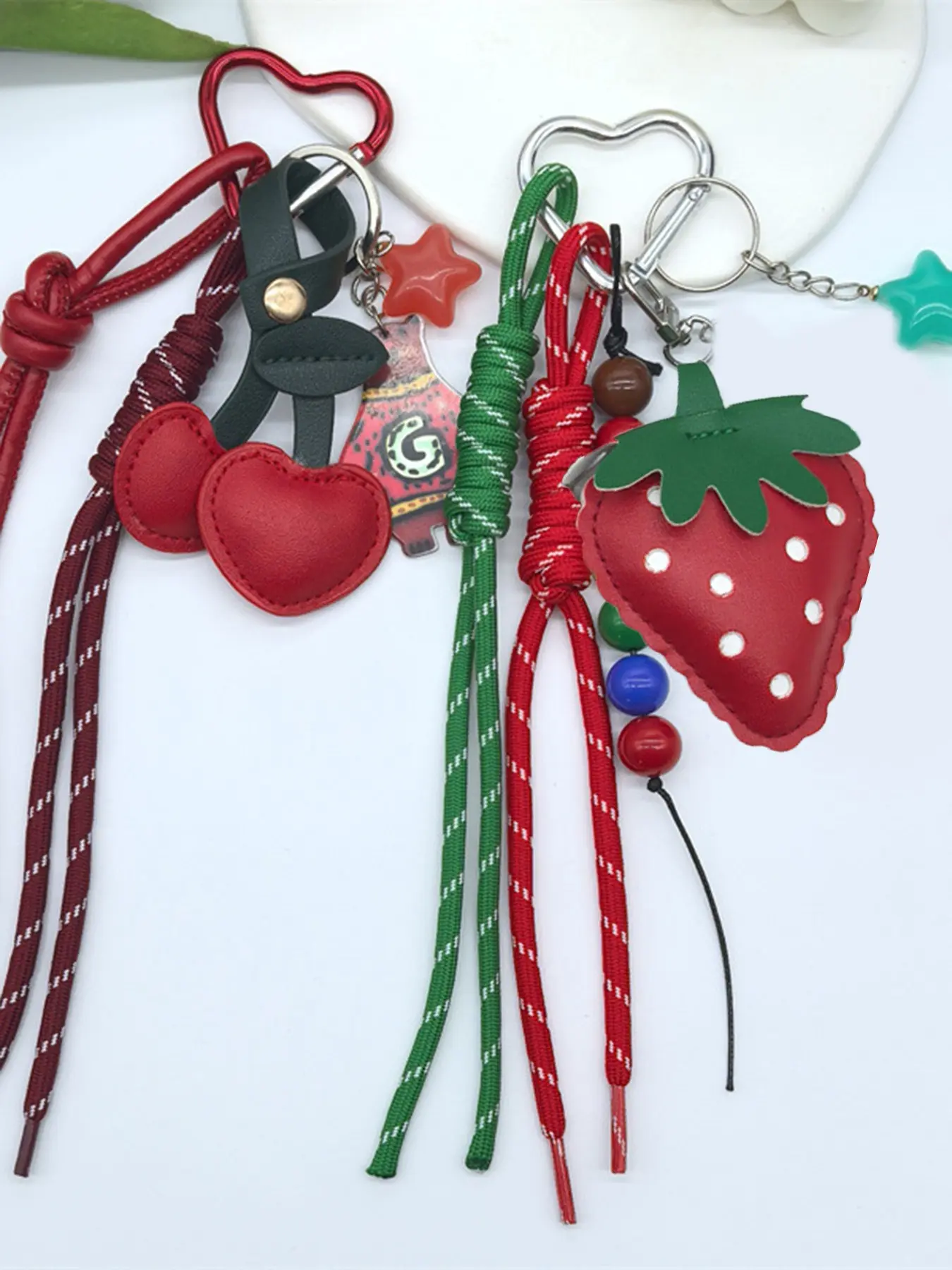 Fashionable retro practical texture exquisite style pendant Charms, designed in the shape of simulated fruits, cherries, and strawberries, lightweight and easy to carry, can be used as a bag hanger and keychain, and can be given as a gift to friends