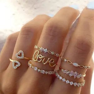 New gold combination joint rings, creative and fashionable, with heart-shaped Love design and diamond accents, 7-piece ring set