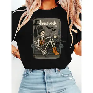 [100% Cotton] T - Shirt With "Homebody" Graphic, Featuring A Skeleton Relaxing On A Couch, Reading, With Bat & Witchy Elements, Ideal For Cozy - Loving, Spooky - Season Enthusiasts, Delivering A Playful, Homey Halloween Vibe T-Shirt For Men And Women