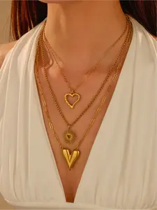 3-Piece Elegant High-Quality Stainless Steel Necklace Set for Women. Features include uniquely shaped heart pendants, stackable necklaces, gold openwork heart jewelry, and 18K gold plated pieces. Hypoallergenic and fade-resistant. Perfect for everyday wea