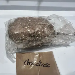 Paquita la del barro- shokofrezza creation. Brown clay filled with pieces of white clay caolin.